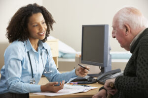Young female Doctor with senior male